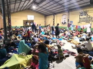 Honduran Migrant families gathered in gymnasium