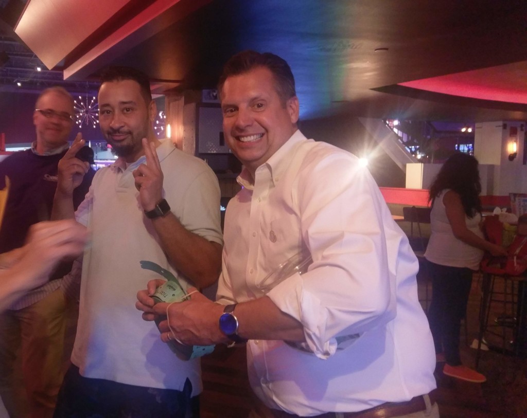 Cabrini Mission Attendees at 2019 Bowling Event holding raffle tickets