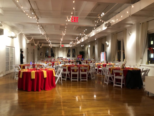 Spirit of Christmas 2019 tables and chairs waiting for party to start